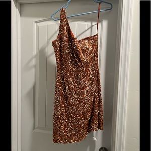 Short brown shiny one shoulder dress. Worn only once!